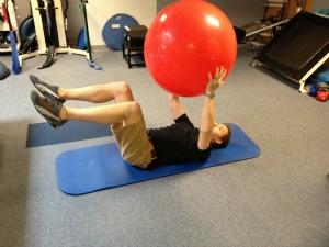 Exercise ball crunch pass