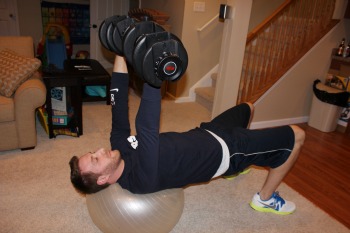 Dumbbell fly on stability ball
