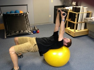 Exercise ball serratus punches