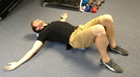 Chest stretch using a foam roller