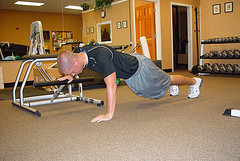 Modified push ups with pilates chair
