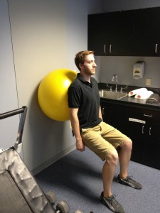 Wall squats with exercise ball