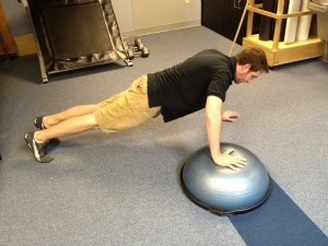 BOSU plank walk over