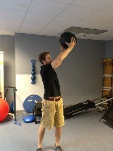 medicine ball squat with rotation