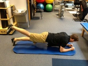 Plank with leg extension